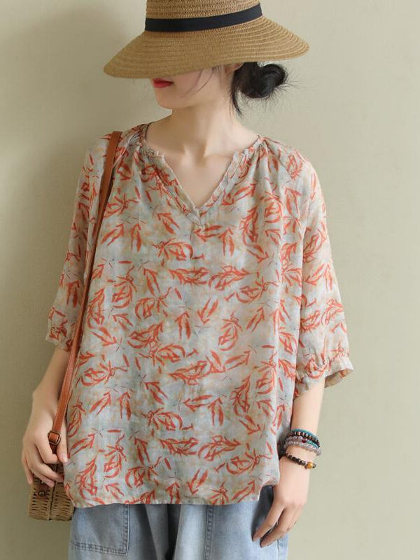 Loose short-sleeved cotton shirt with floral print